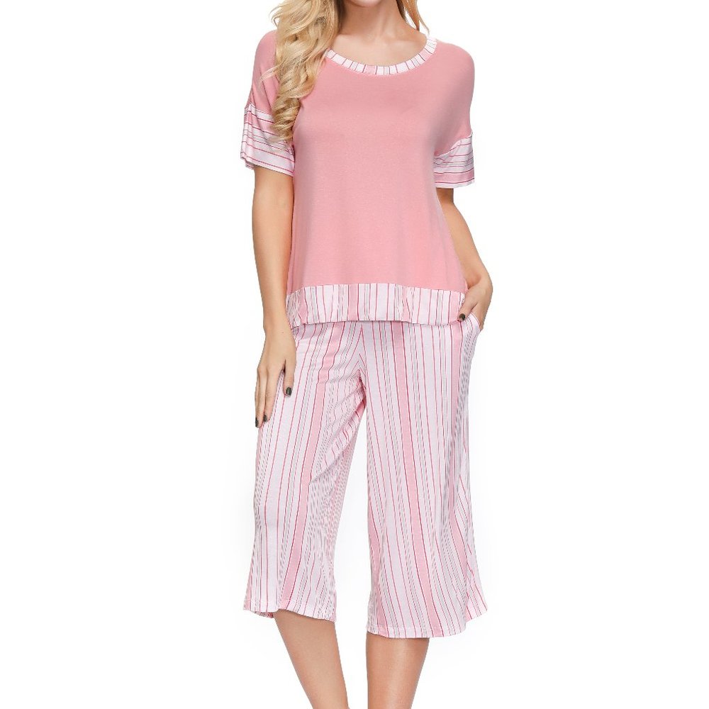 BRAND NEW OVERSIZE TOP WITH THE CAPRI SET